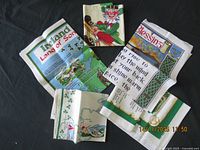 All five folded towels showing main graphics