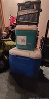 Three coolers stacked showing sizes and styles