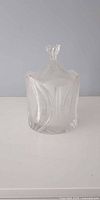 Crystal candy dish standing upright with lid on