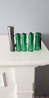 Group shot of five flashlights