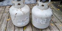 Front view of both propane tanks showing size and labels