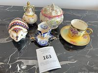 Group shot of all six porcelain pieces