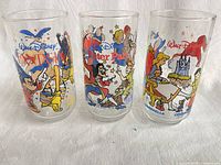 Group shot of all three Disney promotional glasses