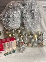 Complete lot showing tinsel, ornament packs, light set box and jingle bells