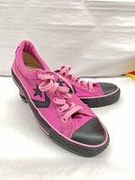 Top and side view of both sneakers showing color, design and condition