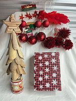 Full lot: driftwood tree, assorted red ornaments, plaid gift box
