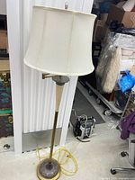 Full view of floor lamp with shade
