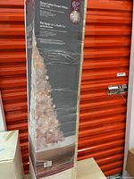 Box showing image and size of the white pre-lit tree