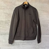 Front view of Bench charcoal sweater on hanger