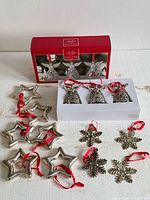 All ornaments displayed with Lenox box: 3 angels, 6 stars, 4 snowflakes