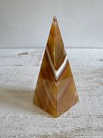 front view of polished stone pyramid