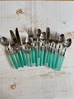 All cutlery pieces laid out showing handles and utensil heads