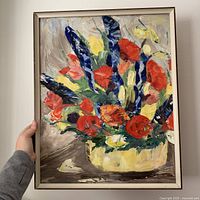 Front view of framed floral painting