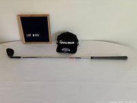 Full view of wedge and hat on table