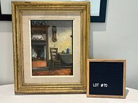 Full view of framed painting beside lot sign