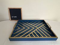 Overall view of blue and gold tray with handles