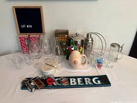 Wide view of complete barware assortment on table