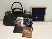 Group shot of doctor handbag, Lug travel wallet, wristlet, J.Crew passport holder