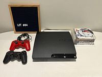 Console, controllers, cable and stacked games overview