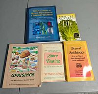 All five books front covers visible