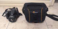 Camera and Lowepro case side by side