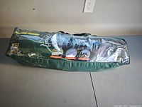 Green Woods carry bag with product graphics and logo