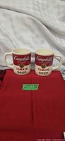 Two Campbell's Tomato Soup mugs front view