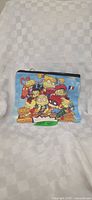Front view of blue canvas cosmetic bag with Rugrats graphic