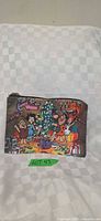 Front of Flintstones Christmas cosmetic bag