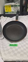 Top view of non-stick frying pan interior and handle