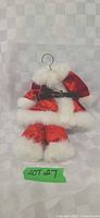 Full view of miniature Santa suit on hanger