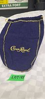 Front view of purple Crown Royal velvet bag with gold embroidery and trim