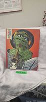 Front of puzzle box showing Oscar the Grouch image and MB 224-piece label