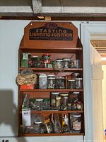 Full view of CMP shelf filled with jars and hardware