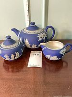 Full set showing teapot, lidded sugar, creamer