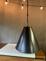 Full view of cone pendant lamp hanging
