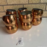 Front view of stacked Coppercraft Guild roly-poly tumblers