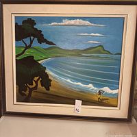 Full view of framed coastal landscape painting