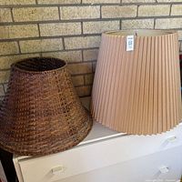 Both lampshades side by side on surface