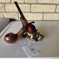 Two pipes on brass skull rest (rest not included) showing overall appearance