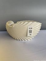 Side view of Sylvac shell-shaped vase showing spiral ridges and opening