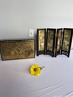 Full view of lacquer box and folded screen