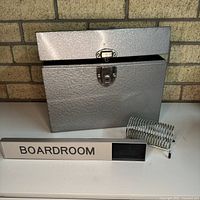 File box, boardroom sign, wire holder together