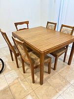 full view of table with four chairs