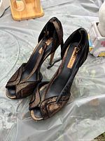 Top view of both shoes showing style and interior brand plate