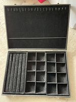 Overall open case showing lid hooks and compartment tray