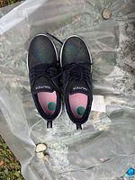 Top view of Nautica kids sneakers on plastic sheet