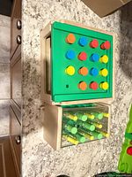 Top view of peg board and plastic holder