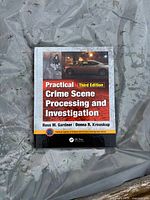 Front cover of textbook showing title, authors, edition and overall condition