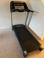 Full view of Horizon treadmill showing console, frame, and belt